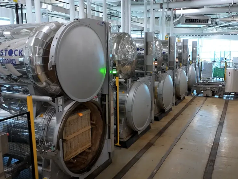 Beverage canning equipment in a factory