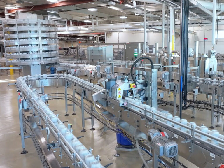 Cans moving on a manufacturing line